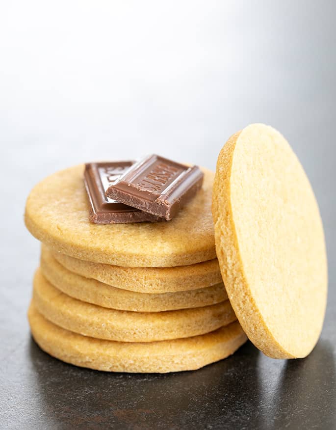 Stack of soft graham crackers with chocolate pieces on top