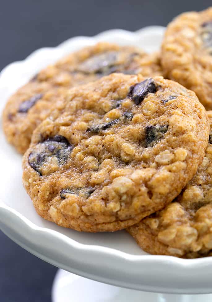 Closeup image of pumpkin oatmeal cookies on a cake plate