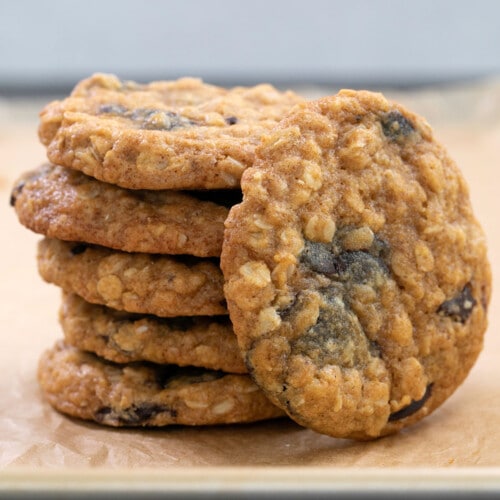 stack of 5 gluten free pumpkin oatmeal cookies with one standing on its side