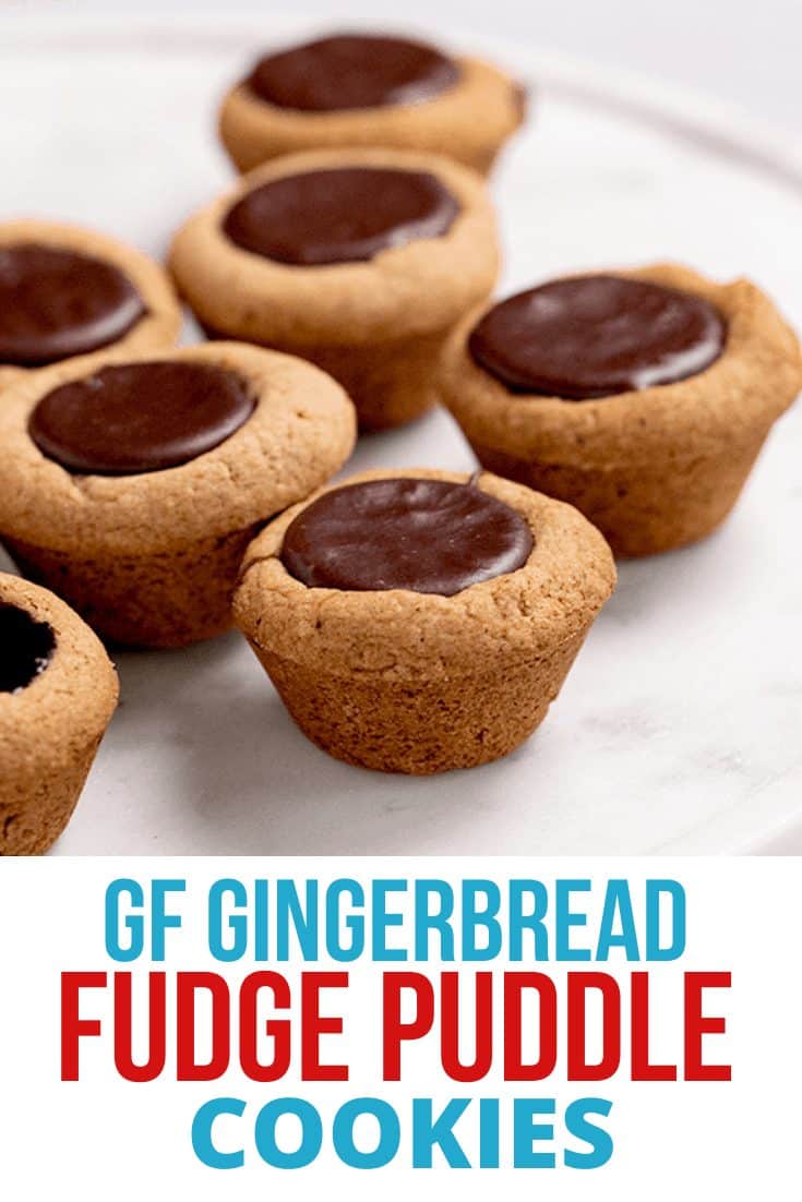 Gingerbread fudge puddle cookies on a round marble platter with writing that says GF Gingerbread Fudge Puddle Cookies