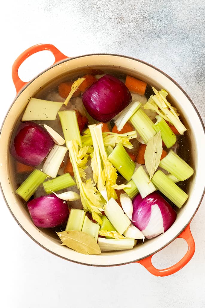 Overhead image of chicken stock ingredients