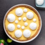 overhead image of whole gluten free key lime pie with white meringues