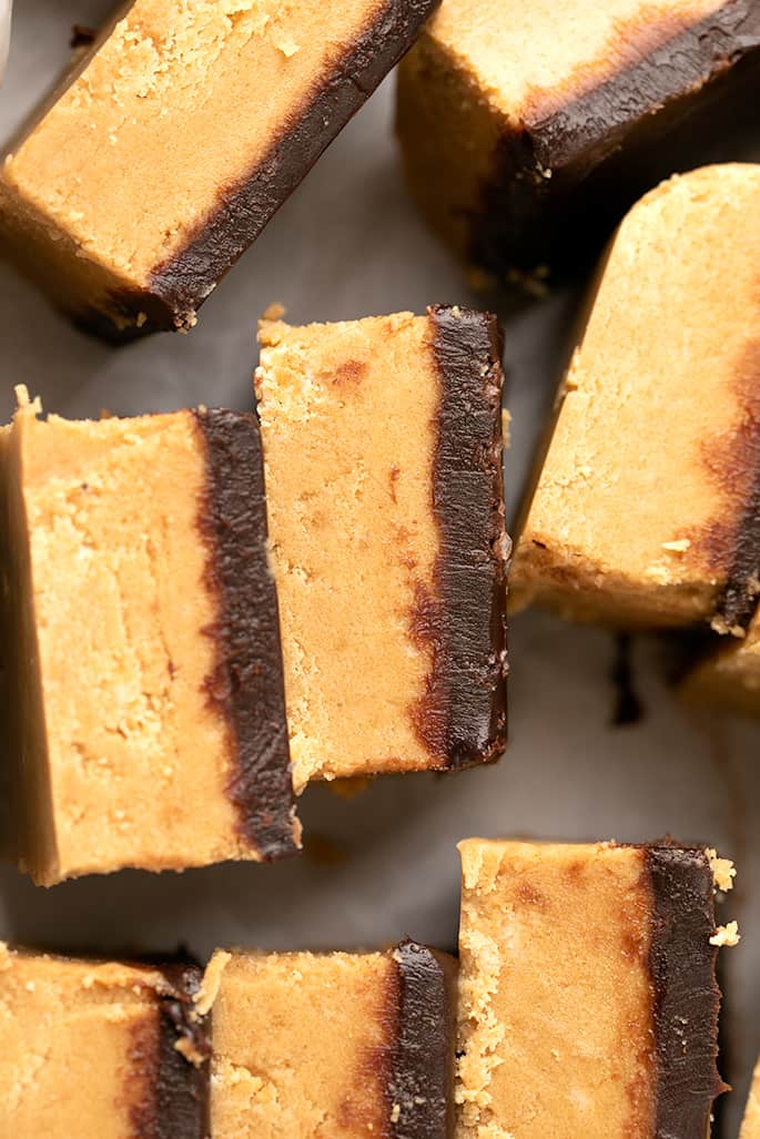 Overhead image of chocolate topped peanut butter bars on their sides