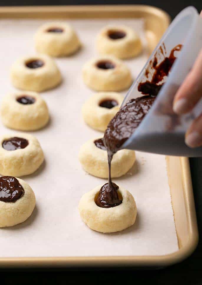 A close up of a gluten free thumbprint cookie