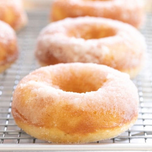 gluten free vanilla donuts on wire rack