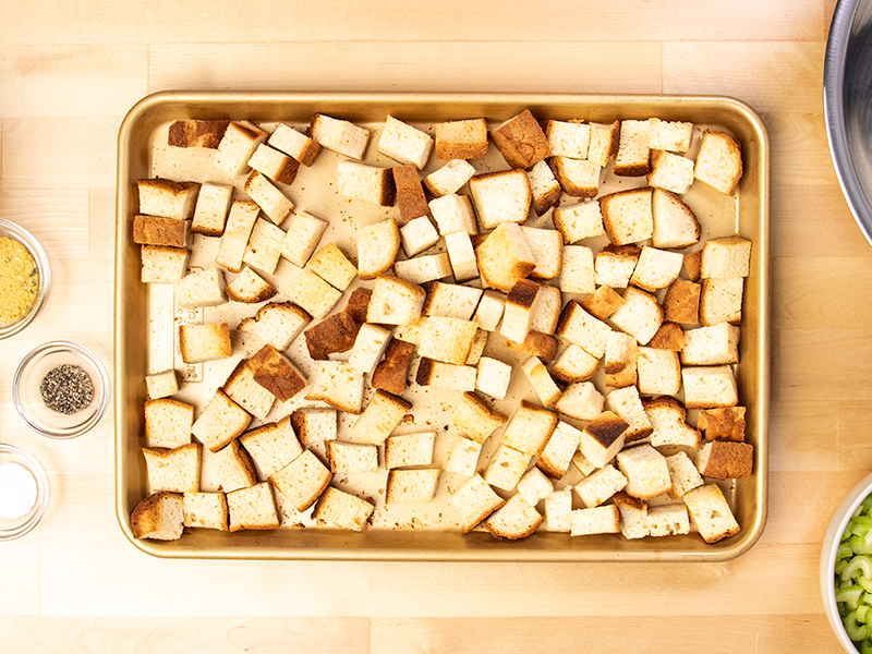 gluten free stuffing bread cubes on metal baking tray