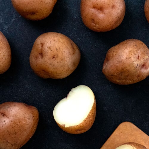 cooked red skin gluten free potatoes with one cut in half