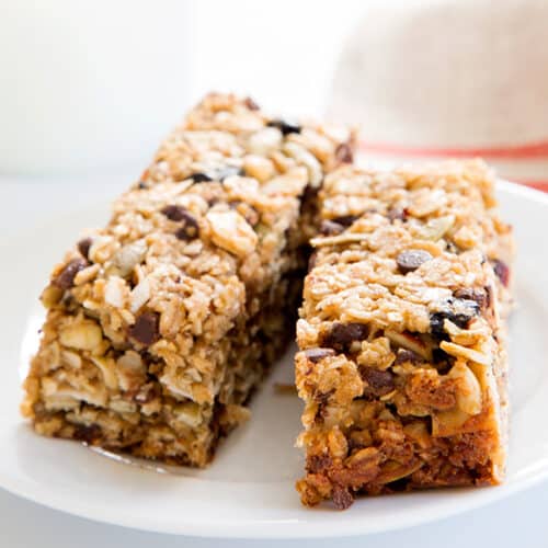 two rectangular granola bars on a white plate