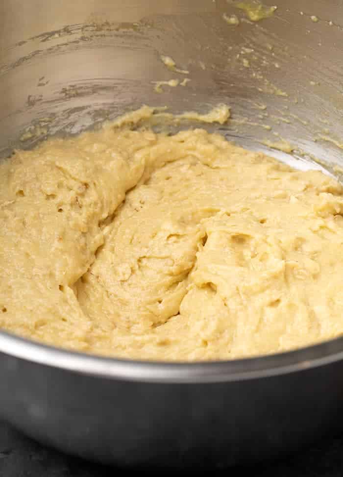 Oat bread batter in metal mixing bowl