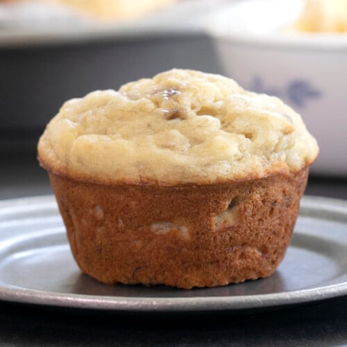 gluten free banana muffins single muffin on small gray plate