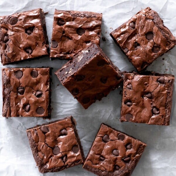 9 gluten free brownies on white paper