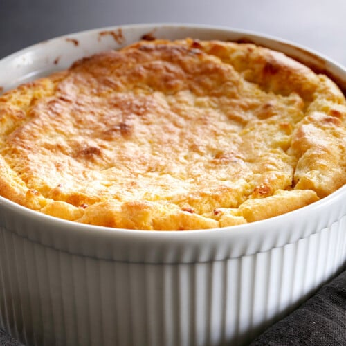 whole gluten free cornmeal spoonbread in white casserole dish