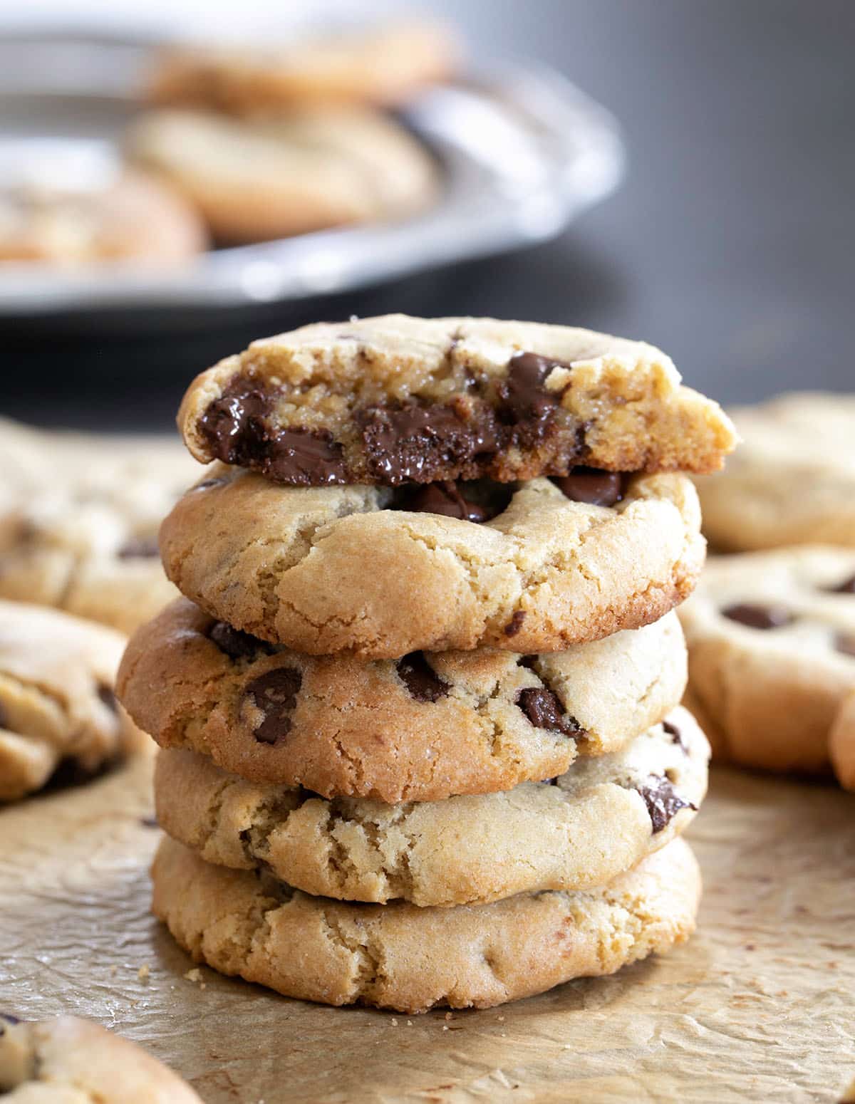 A stack of 5 gluten free chocolate chip cookies.