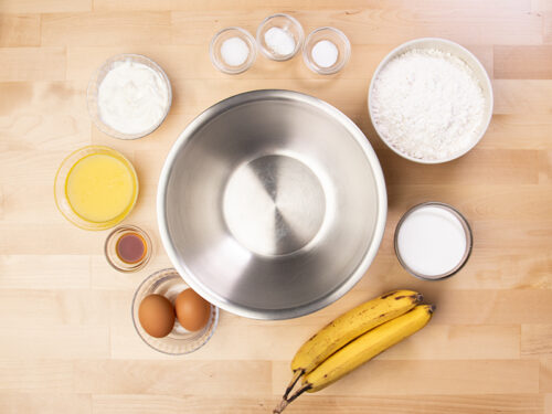 banana bread ingredients with large metal round mixing bowl