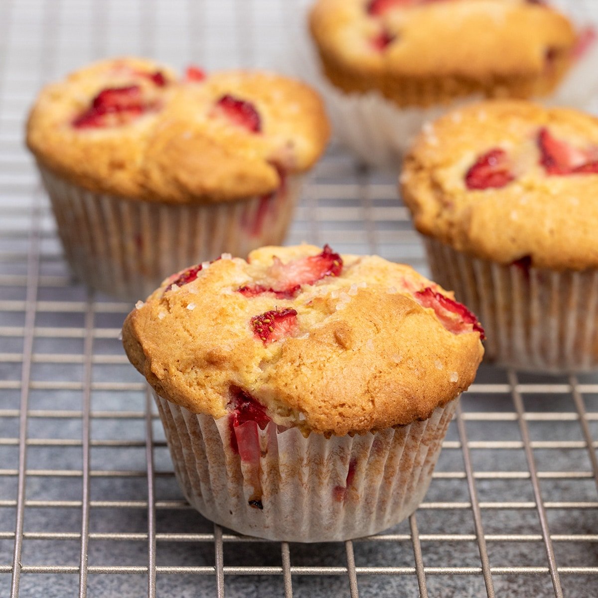 4 gluten free strawberry muffins on wire rack