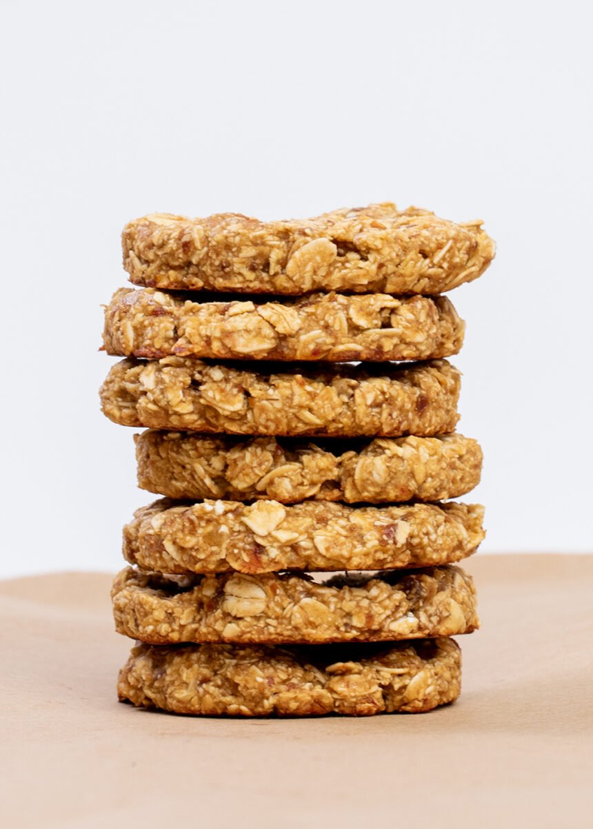 Stack of 7 3-ingredient oatmeal cookies on brown paper