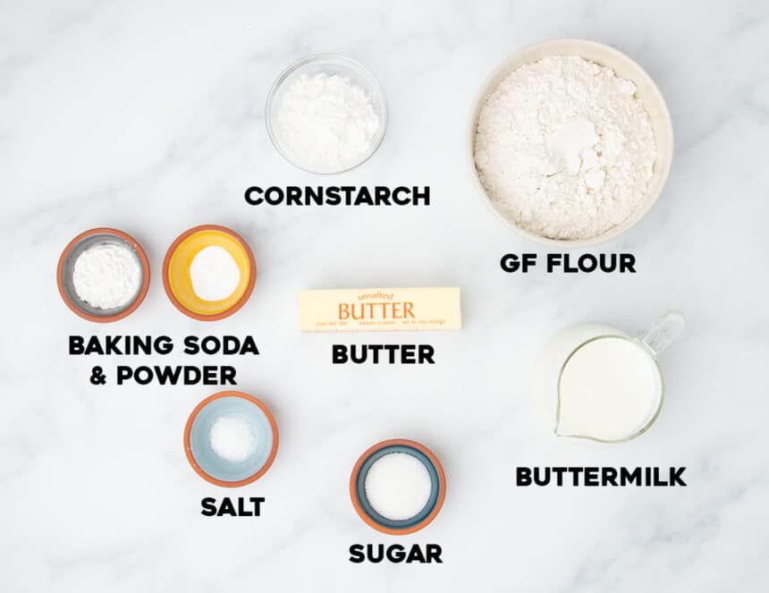 gluten free biscuits ingredients in small bowls with black block letters spelling names of ingredients