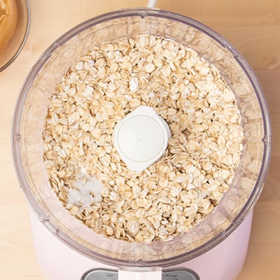 Oats and salt in food processor bowl