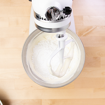 Powdered sugar in stand mixer bowl