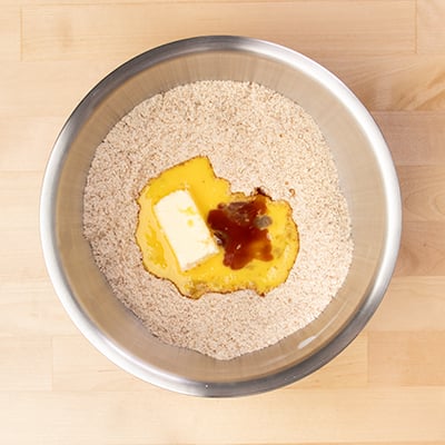 butter, vanilla and beaten eggs in mixing bowl