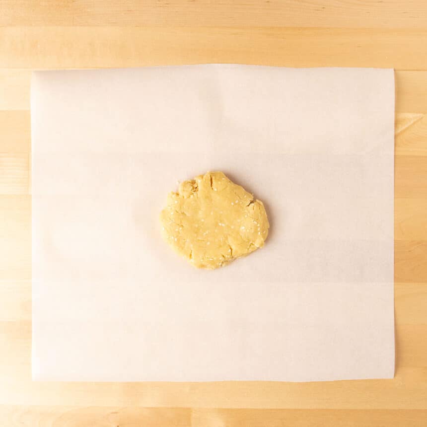 raw light brown cracker dough on white paper