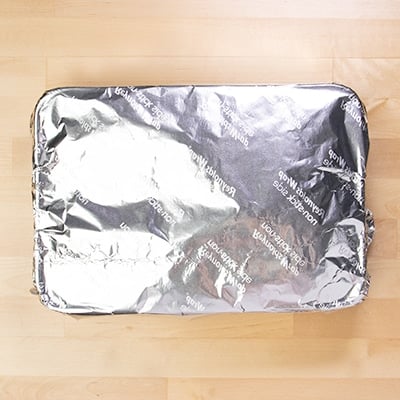 Nonstick aluminum foil covering rectangular casserole dish