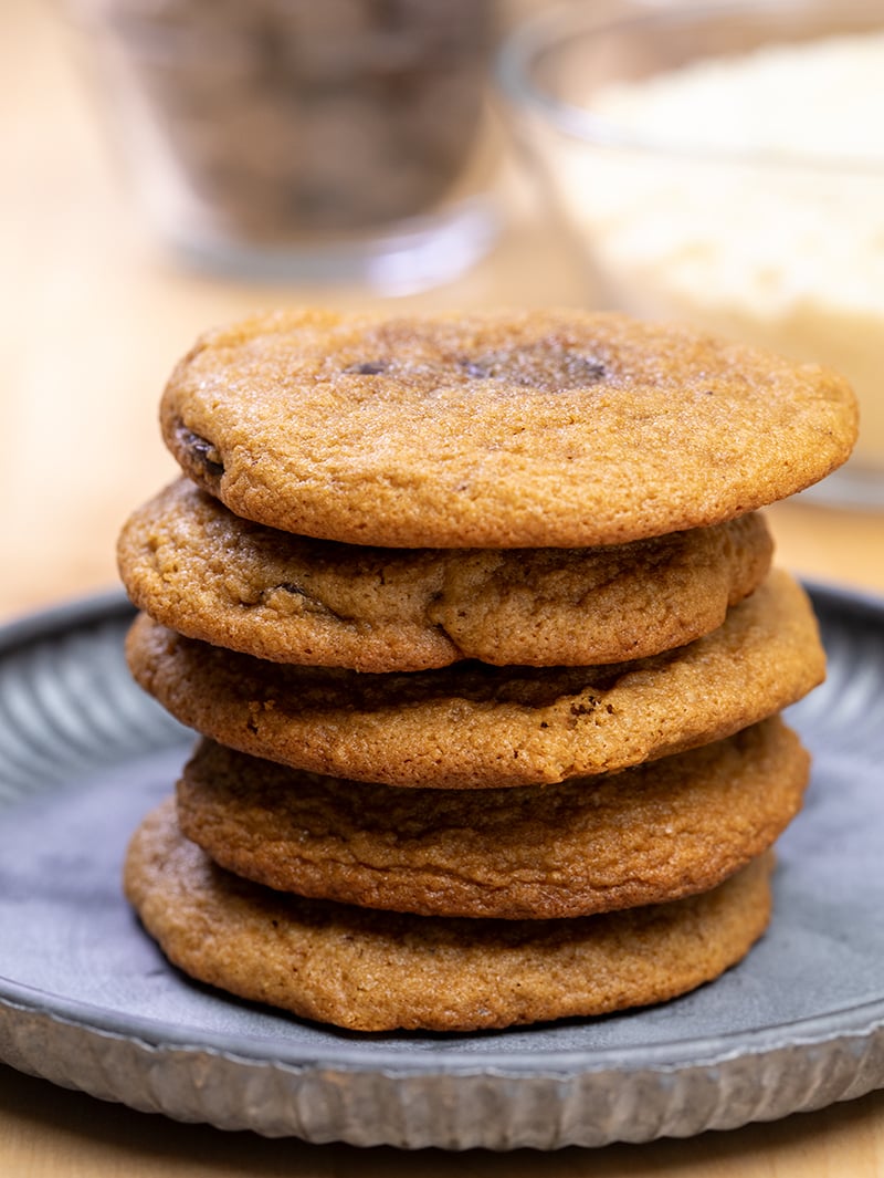 Stack of 5 almond flour chocolate chip cookies on small gray plate