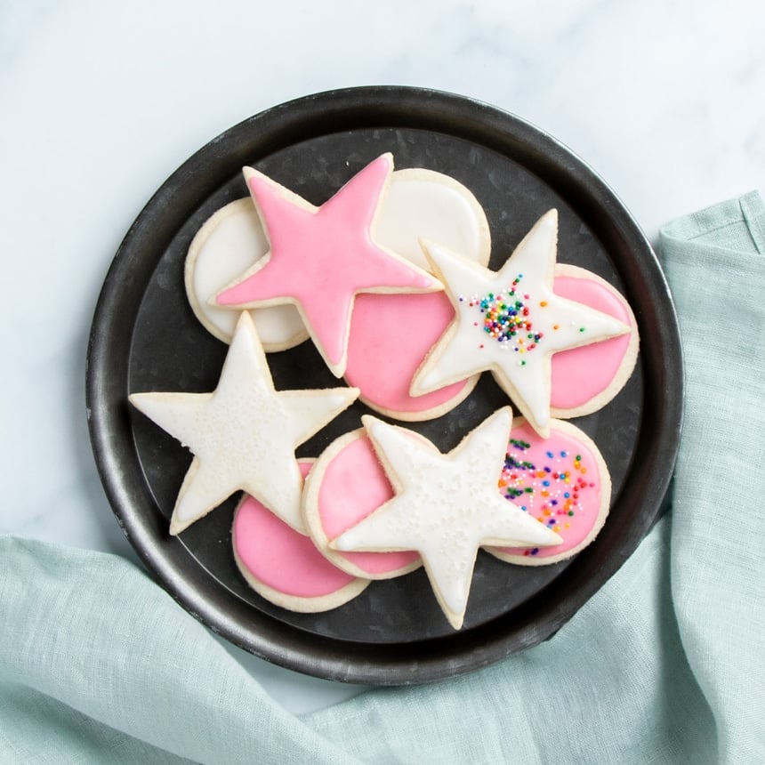 almond flour sugar cookies shaped like stars and rounds