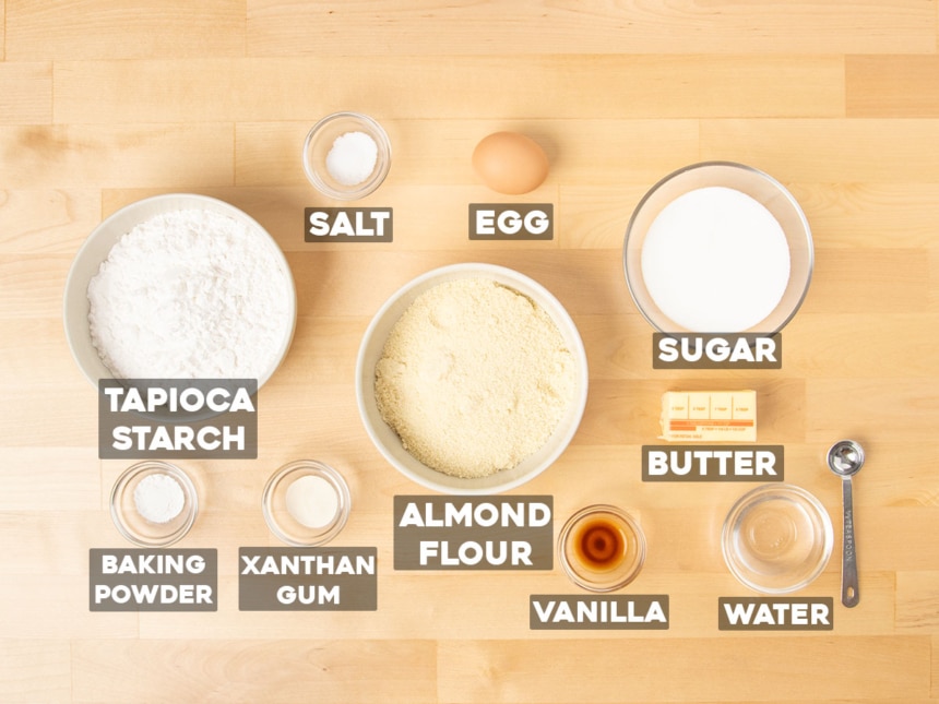 almond flour sugar cookies ingredients in small bowls with words