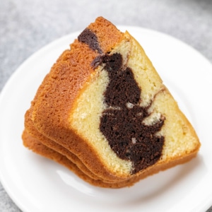 gluten free bundt cake slice on small white plate