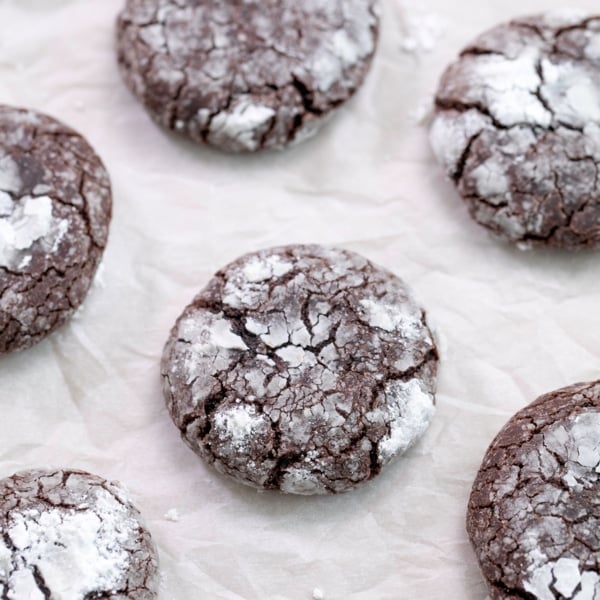 overhead image of 6 gluten free chocolate crinkle cookies