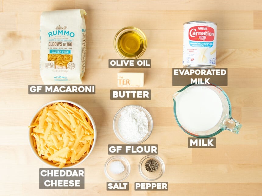 gluten free mac and cheese ingredients in small bowls with words indicating what each ingredient is