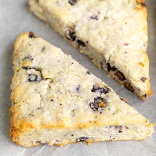 overhead image of gluten free scones on white paper