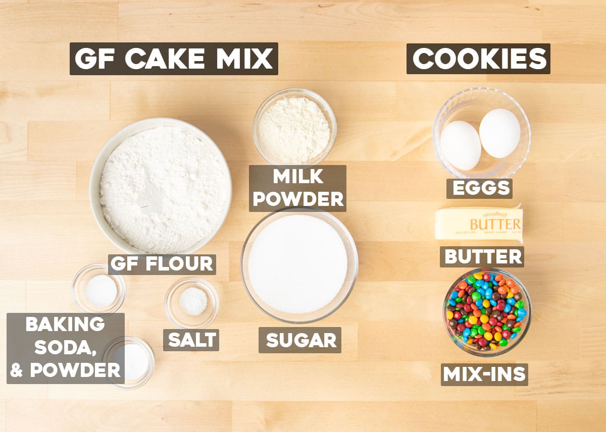 Ingredients for homemade gluten free cake mix and then ingredients like mini M&Ms, butter, and eggs to make cookies.