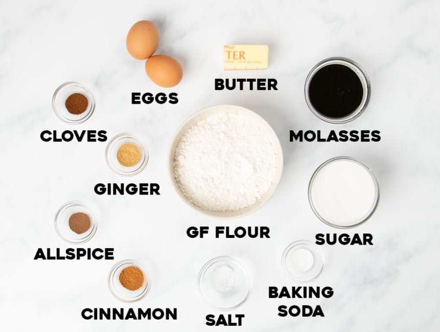 overhead image of ingredients in gluten free molasses cookies with names of ingredients in black type