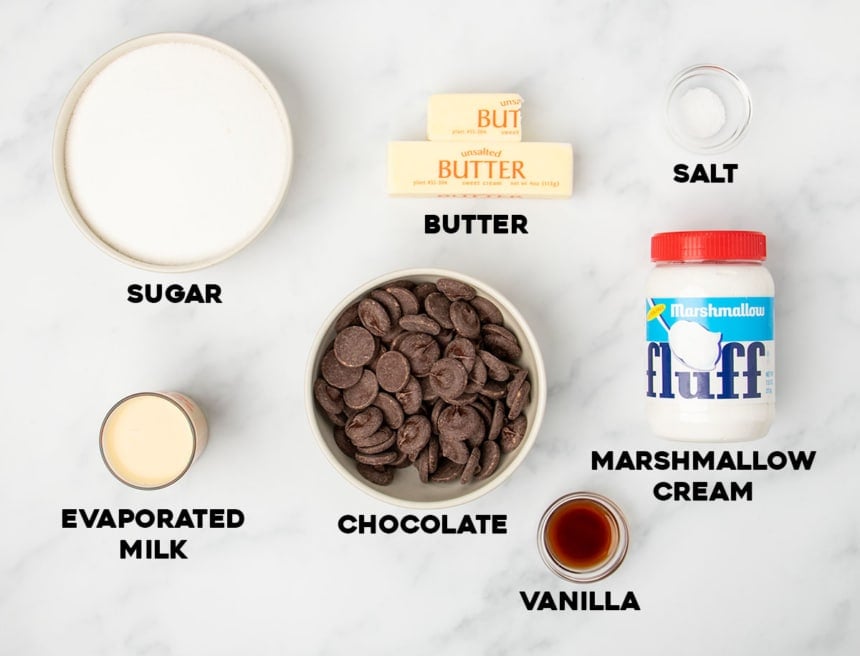 marshmallow cream fudge ingredients in small bowls with words of ingredients added