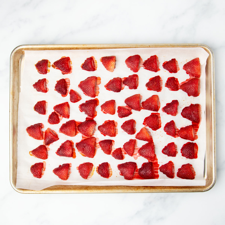 same cut strawberries with thick strawberry juice after having been baked