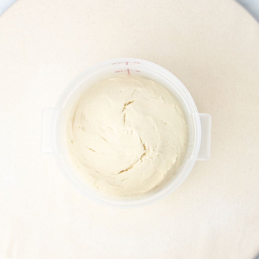 same pizza dough in same bucket, now risen