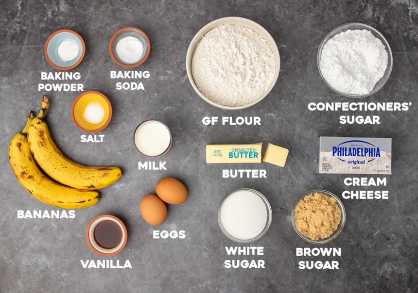 Ingredients for gluten -free banana cake in small bowls with white block letters explain the name of each ingredient