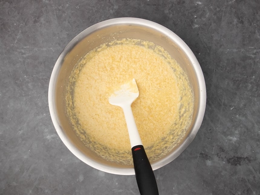 Same mixture of now clearer yellow color after the milk added