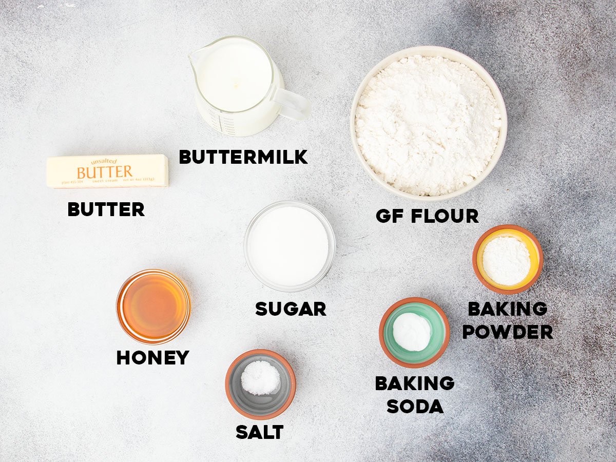 Labeled ingredients for gluten free scones including butter, buttermilk, gluten free flour, sugar, honey, salt, baking powder, and baking soda