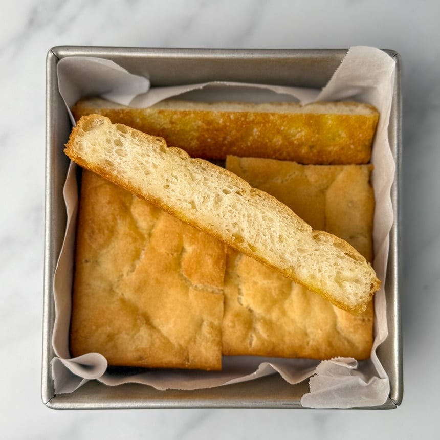 Square flat bread made with Caputo flour, sliced to show crumb and uniform texture.