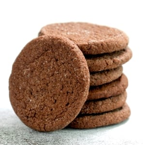 closeup image of stack of gluten free chocolate cookies with one on its side