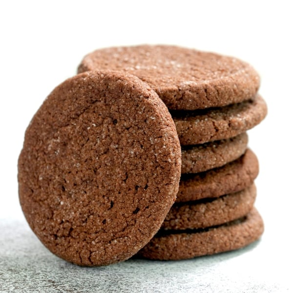 closeup image of stack of gluten free chocolate cookies with one on its side
