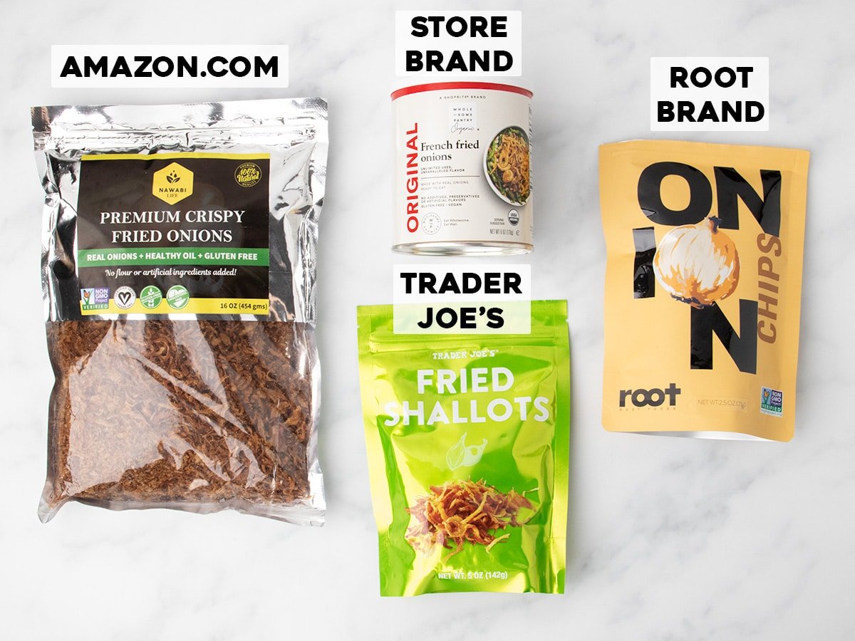 4 different containers of crispy fried onion varieties with black lettering on white rectangles indicating where the brand or source of the package