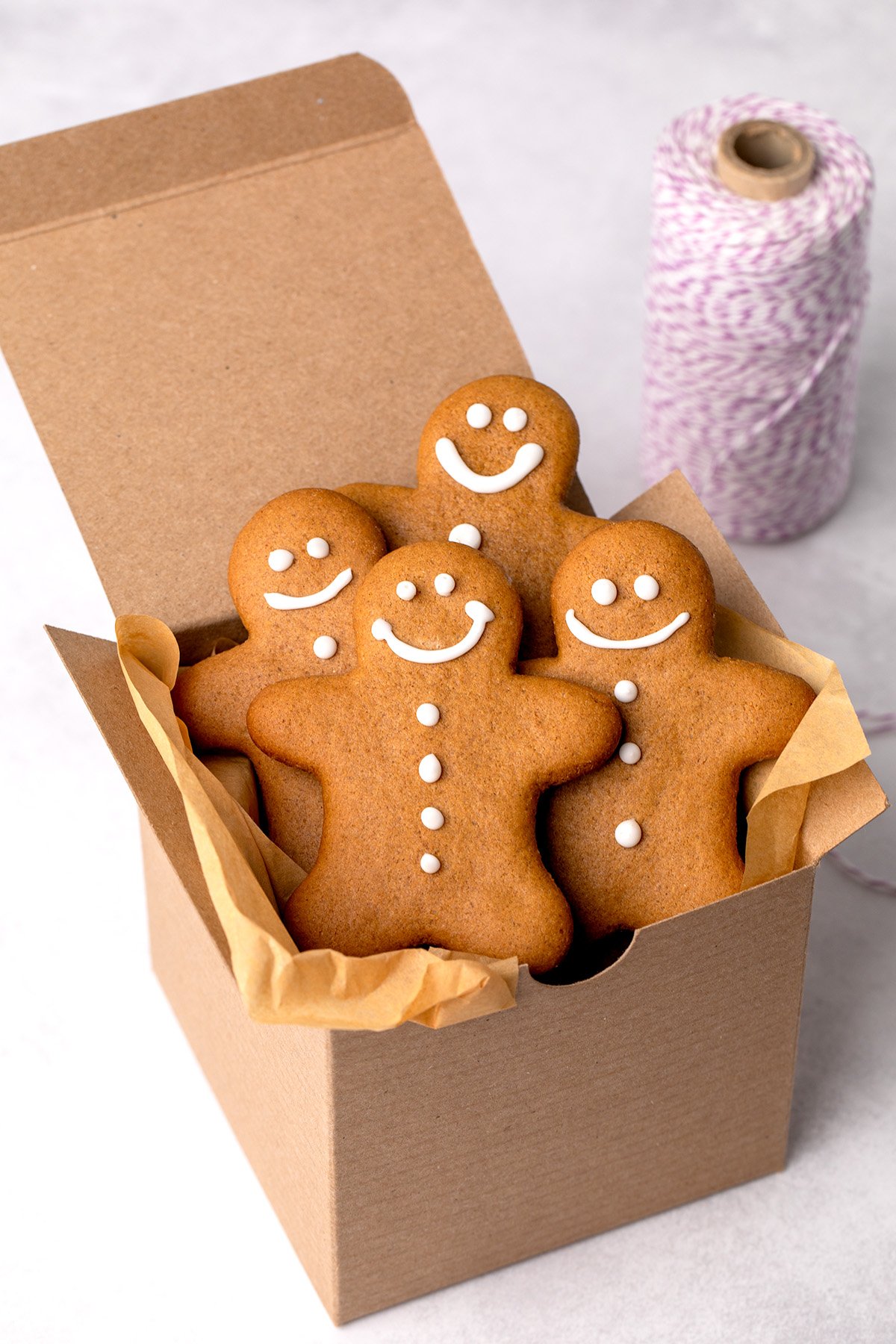gluten free gingerbread men cookies in a brown box