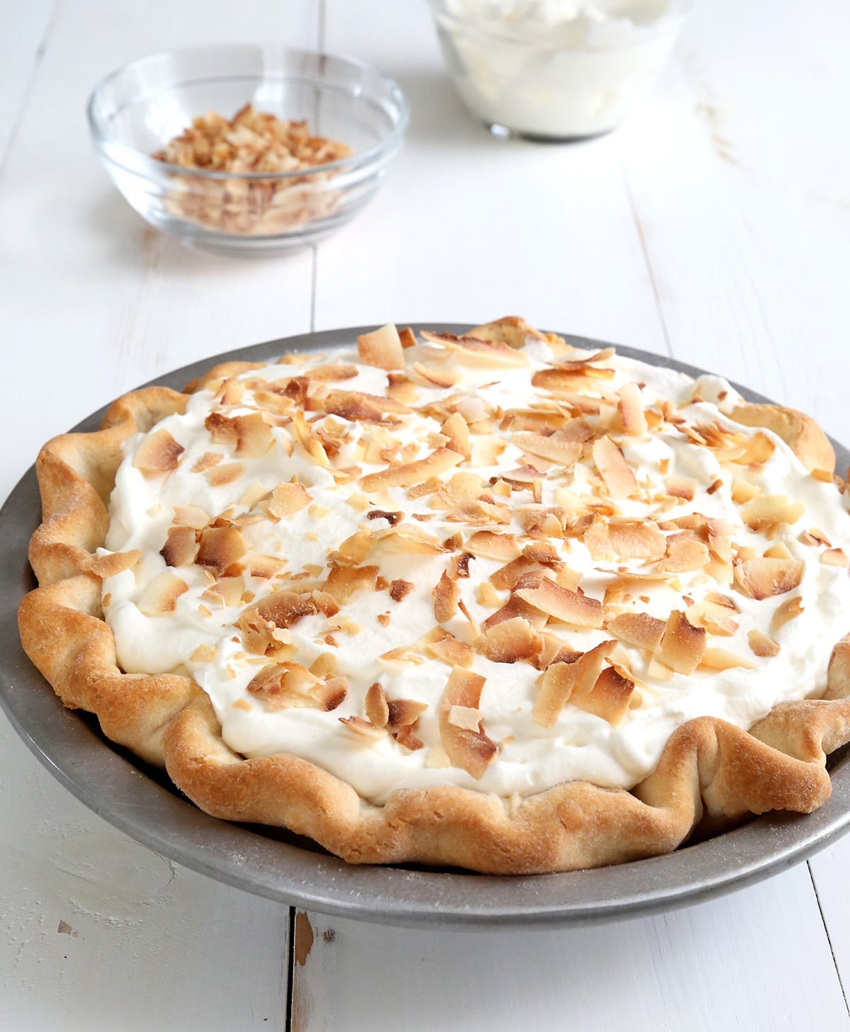 The baked pie whole in a pie plate.