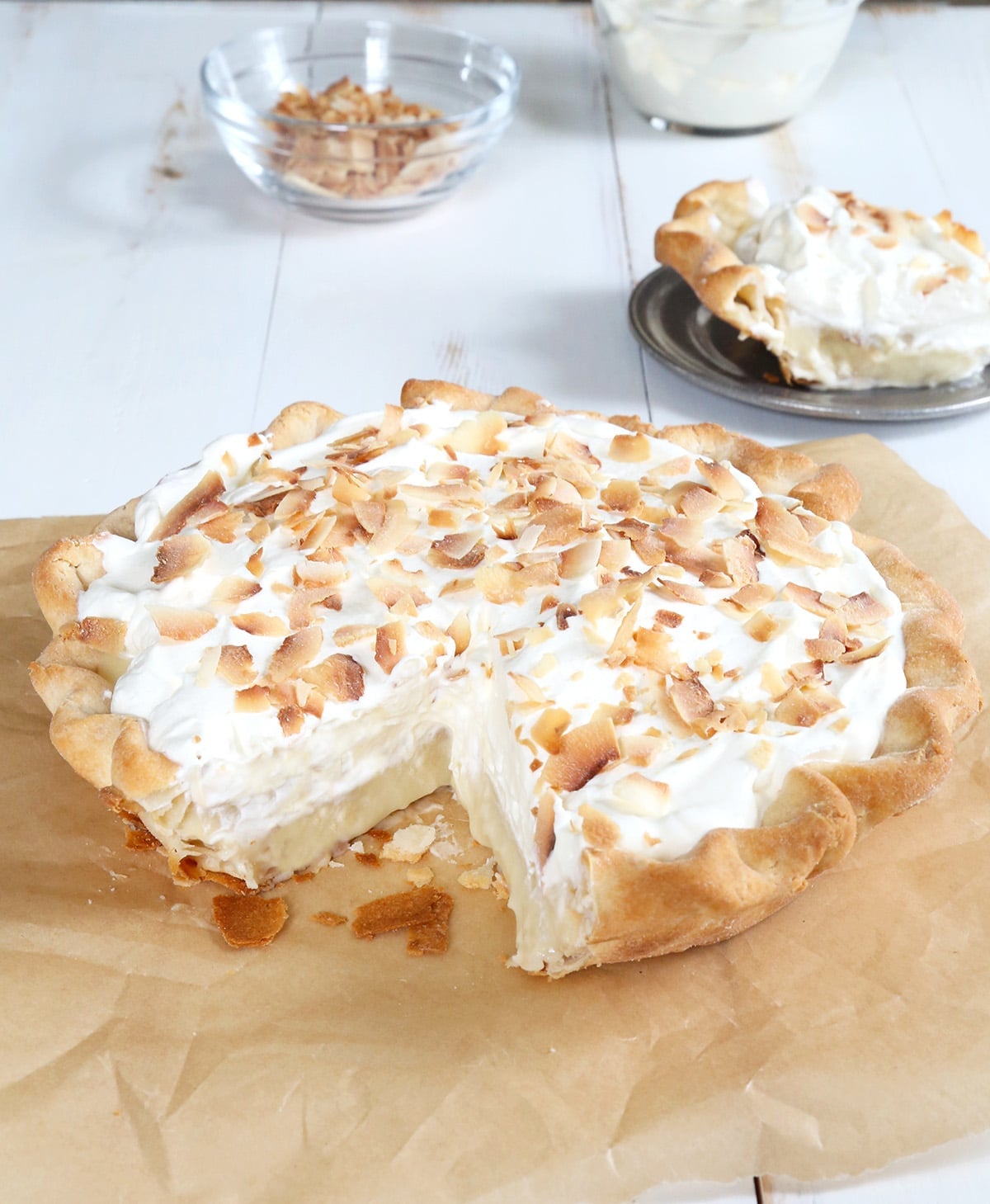 The baked pie with a single slice taken out of it.  